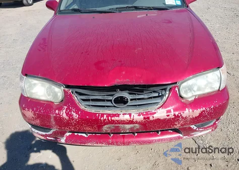 2001 Toyota Corolla Le z USA, uszkodzony, nr VIN 2T1BR12E31C498862